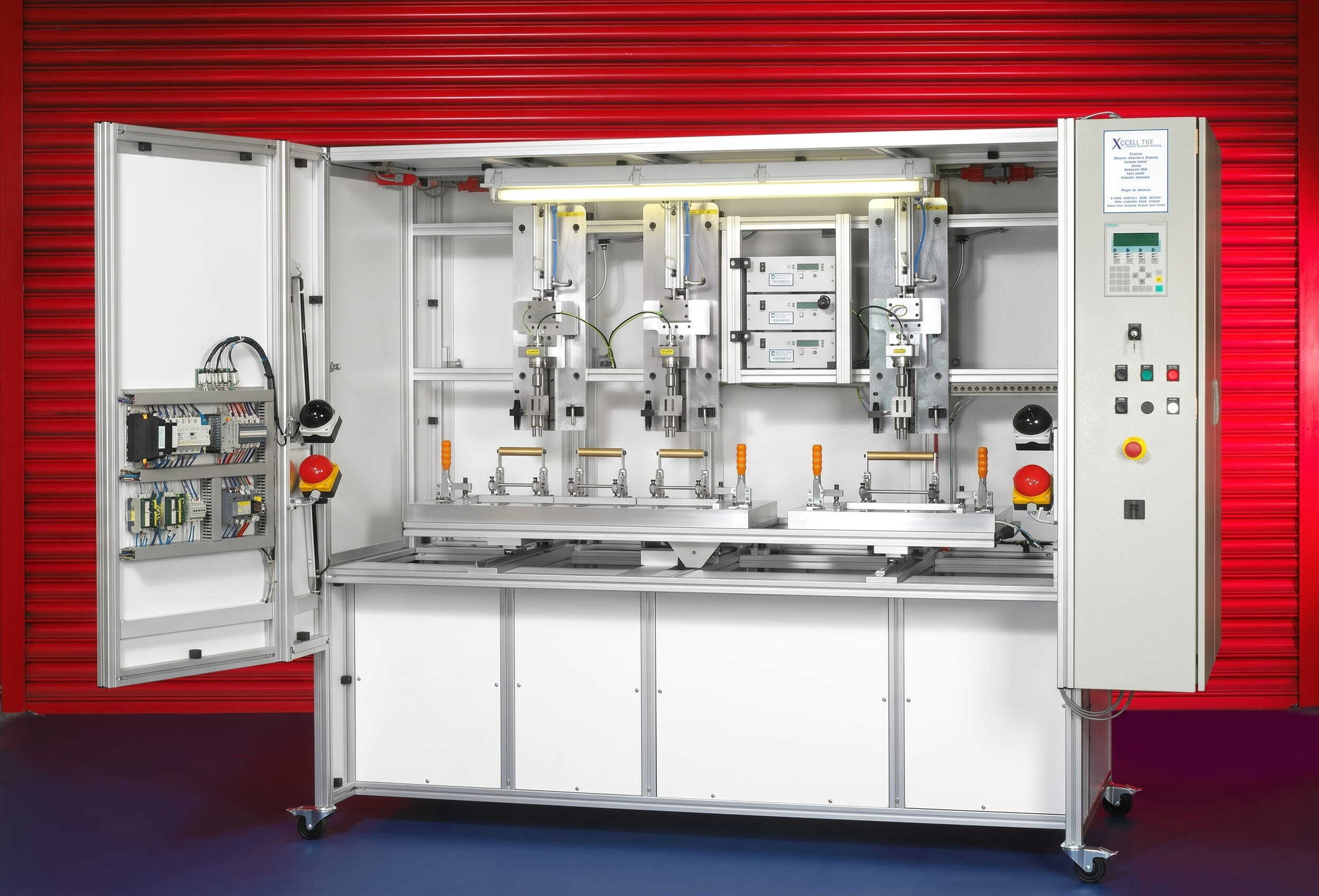 A detailed view of a bespoke industrial special purpose machine (SPM) workstation. Integrated custom controls, visible complex wiring, and multiple precise process stations (probes) exemplify how tailored engineering solves specific, intricate automation and integration challenges.