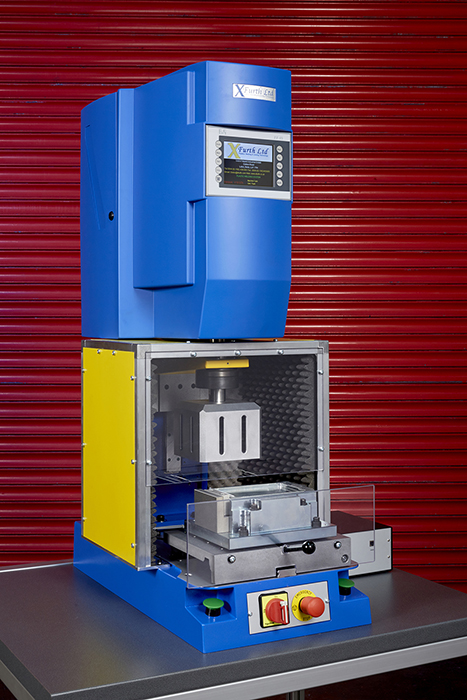 An ultrasonic welding machine. 