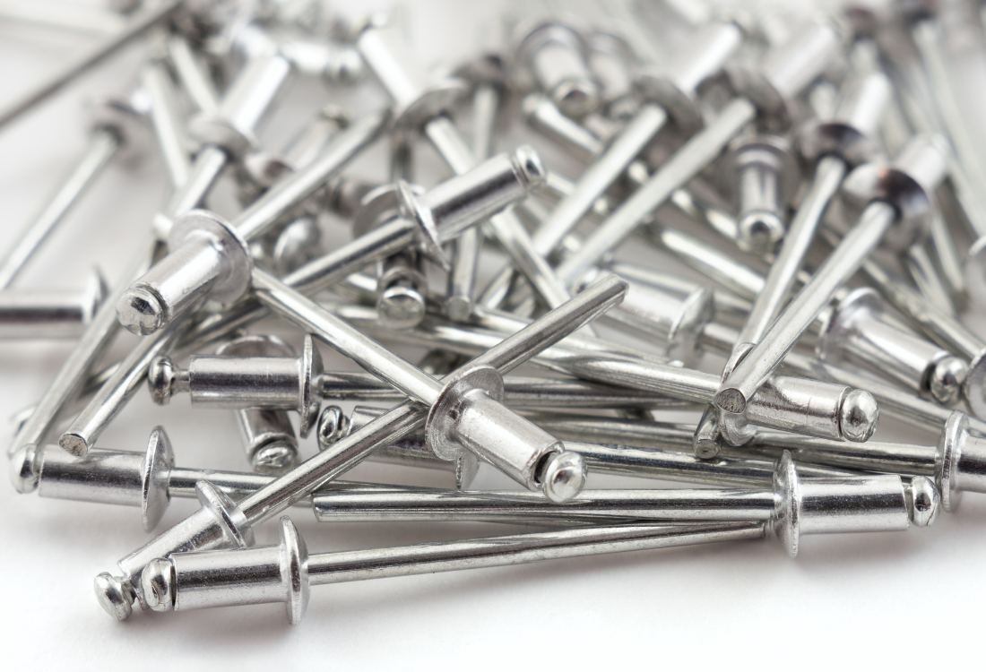 Rivets piled up to be used for plastic riveting for a range of applications.