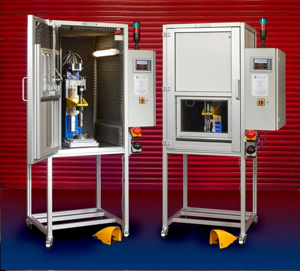 Industrial ultrasonic welding machine used for thermoplastic components, showcasing ultrasonic welding for precision manufacturing.